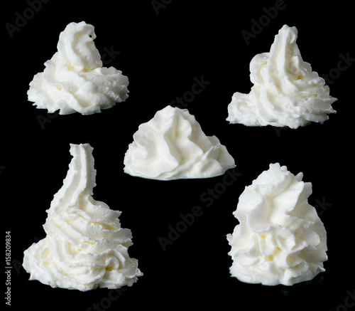 whipped cream on a black background photo