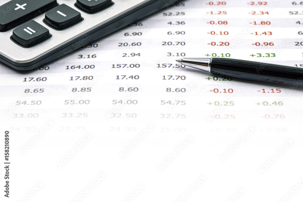 Accounting and finances with pen and calculator, with space for text on white background Accounting and finances with pen and calculator, with space for text on white background