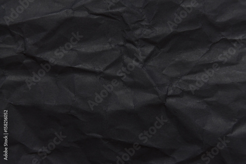 The background paper  crumpled black