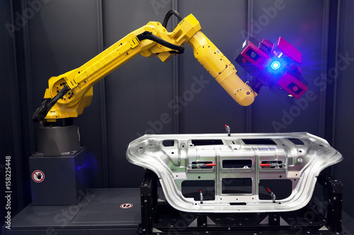Photos Robotic arm with 3D scanner. Automated scanning.