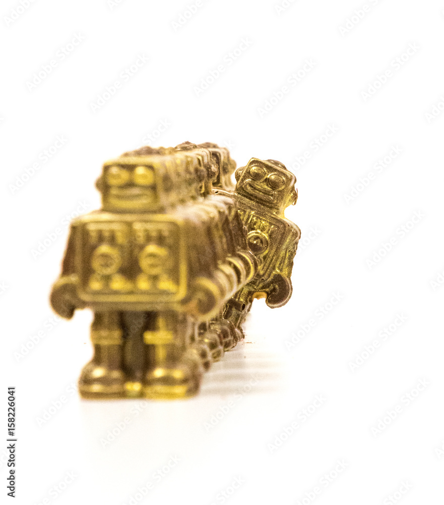 Chocolate robots all in a row with one being cheeky Chocolate robots all in a row with one being cheeky
