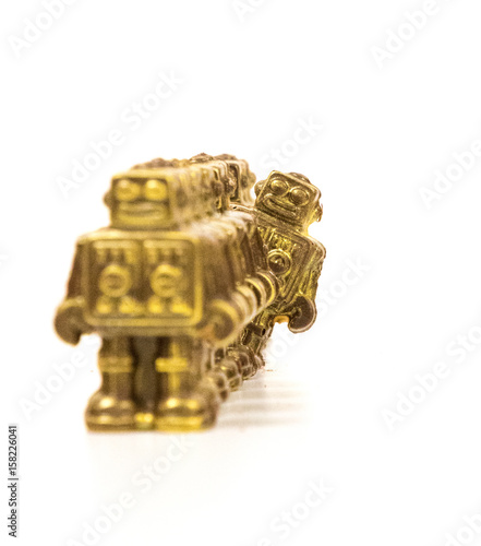 Konstfotografi Chocolate robots all in a row with one being cheeky