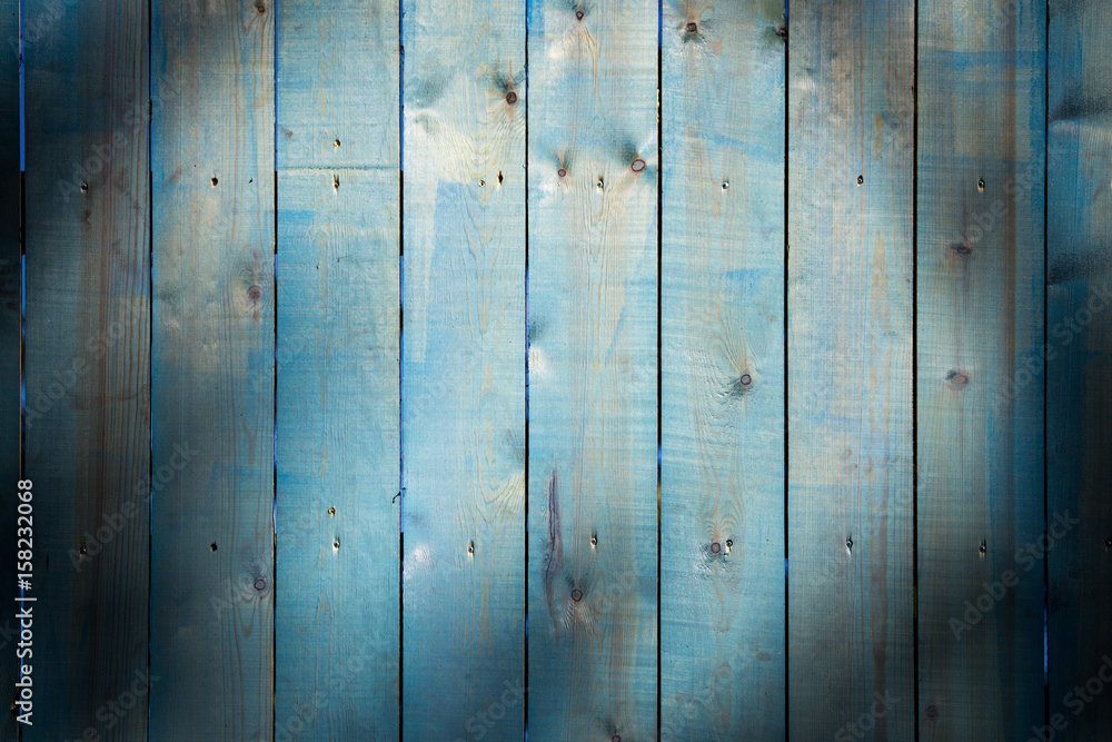The wooden background is painted in blue The wooden background is painted in blue