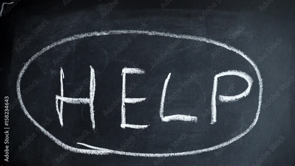 Male hand writing the word help on chalkboard. 4K ProRes HQ codec
