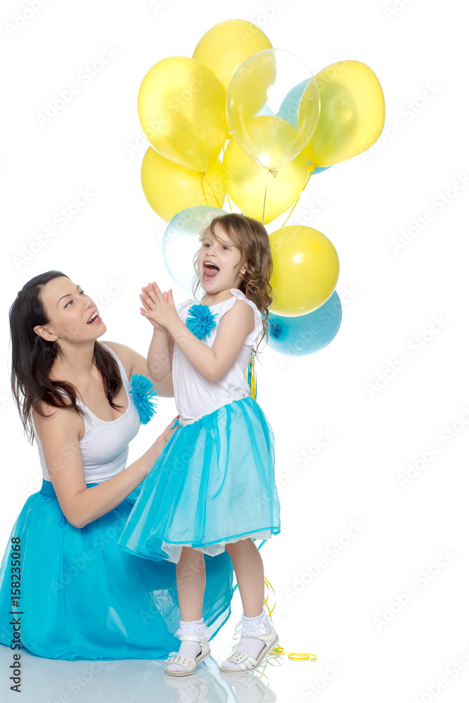 Mom and daughter with colorful balloons. Mom and daughter with colorful balloons.