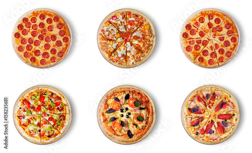 Six different pizza set for menu. Italian food traditional cuisine. Meat pizzas with  mozzarella, salami, sausages, pepperoni and ham.  The third number-Pizza four cheese. 