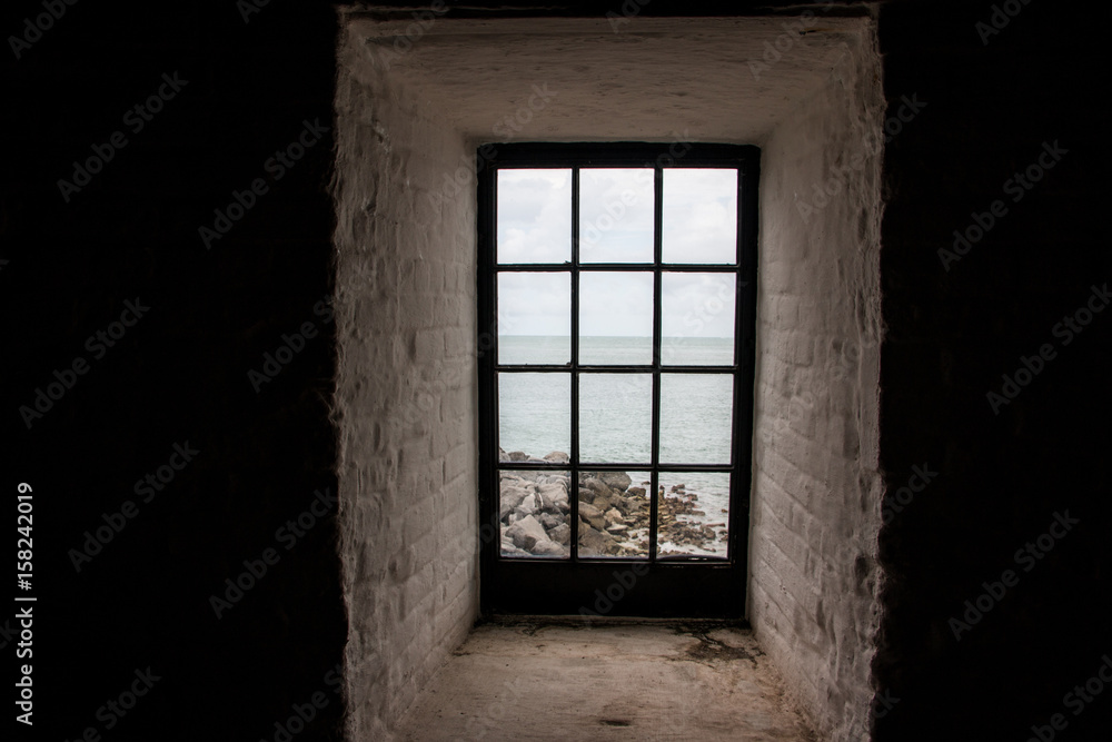 Fototapeta premium looking out lighthouse window