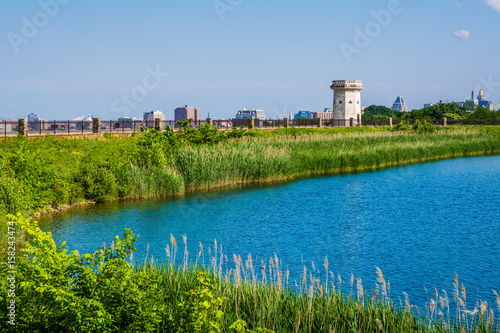 View of Druid Lake and the Moorish Tower at Druid Hill Park in Baltimore, Maryland.