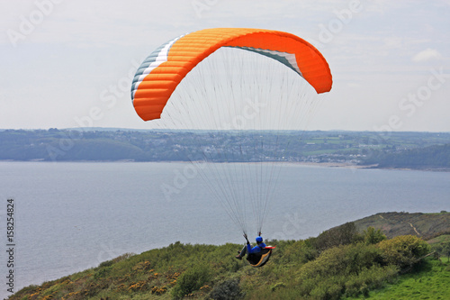 paraglider above the coast