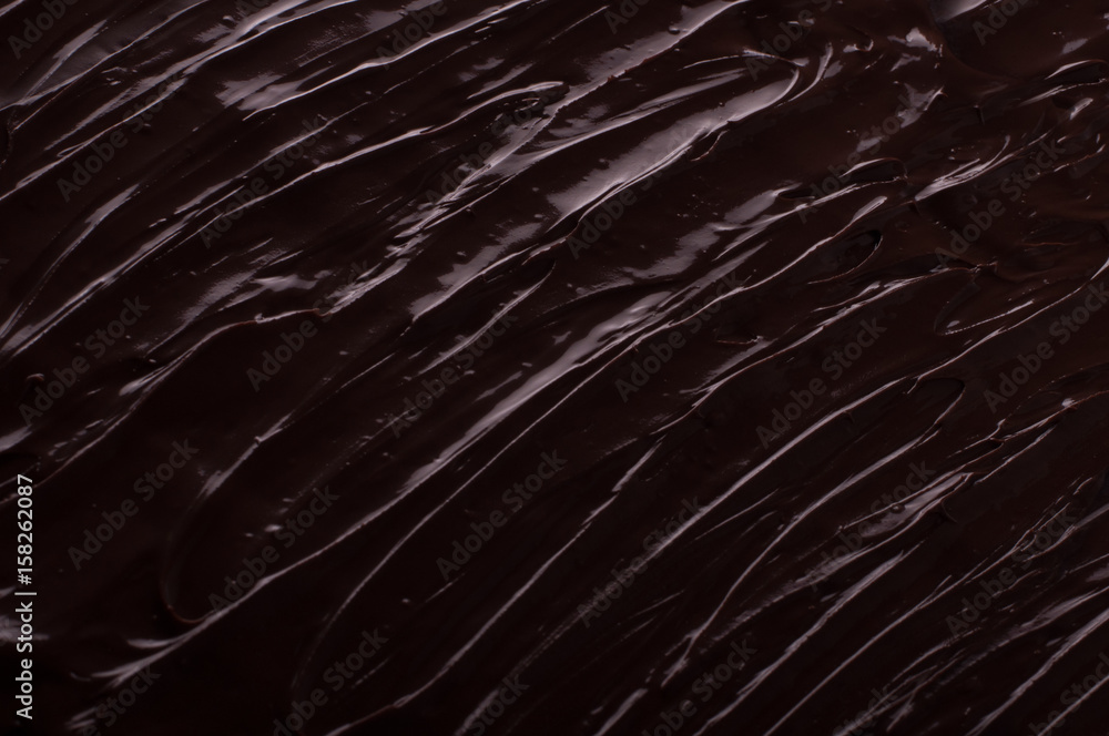 Fototapeta premium Chocolate background waves cooking concept - melted chocolate as a background