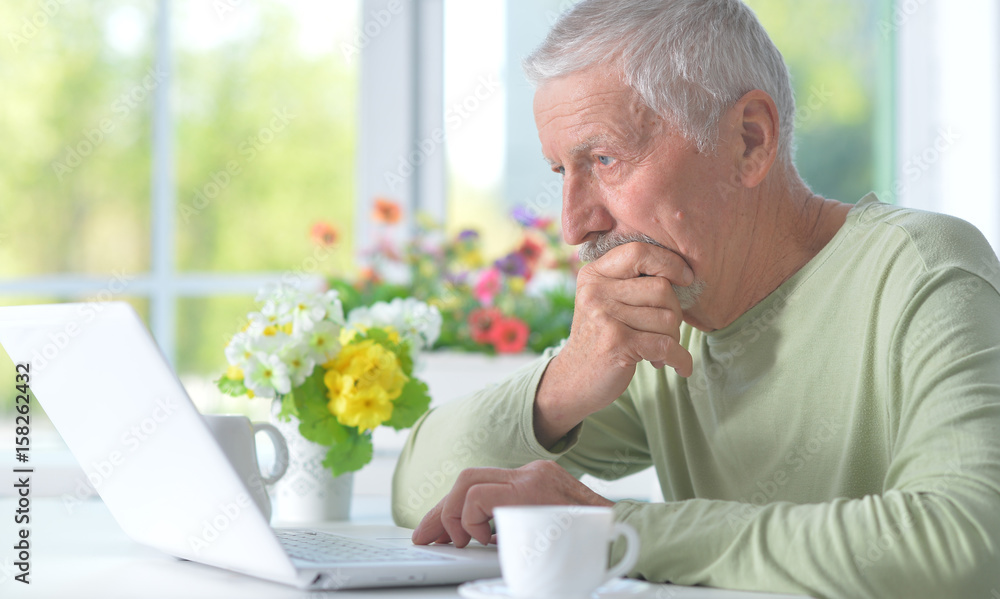 Beautiful old man with a laptop Beautiful old man with a laptop