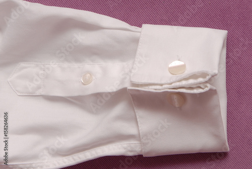 Slika na platnu white cotton shirt, cufflink and cuff, close-up of sleeve
