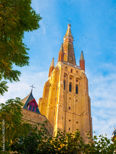 Medieval Church of Our Lady in Bruges on sunny day, Belgium.