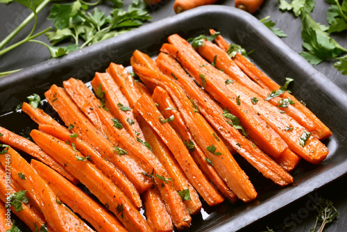Fried carrots in baking tray