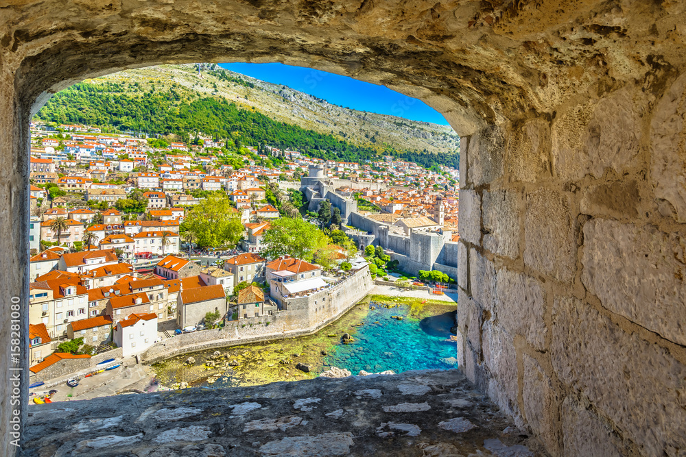 Fototapeta premium Dubrovnik stone window scenic. / Scenic aerial view on coastline of Dubrovnik town, famous touristic attraction in Croatia, Europe.
