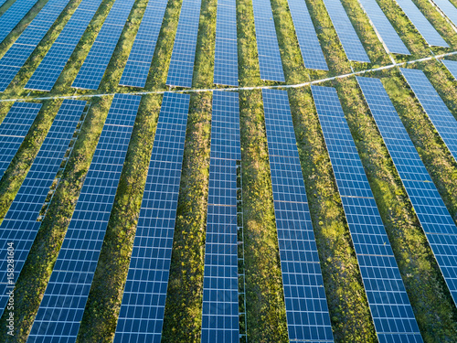 An aerial view of a solar farm set in the english countryside