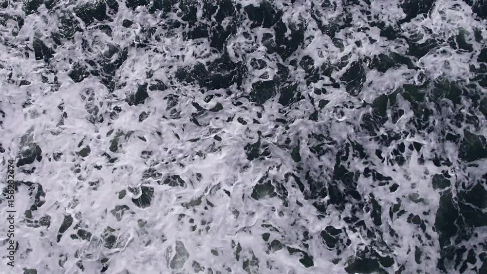 Aerial Top View Video Background from Flying Drone Above Beautiful Clear Sea Water. Wonderful Panoramic Blue Ocean Waves Background. Tropical Aerial View. Crystal Surfing waves in White Background Aerial Top View Video Background from Flying Drone Above Beautiful Clear Sea Water. Wonderful Panoramic Blue Ocean Waves Background. Tropical Aerial View. Crystal Surfing waves in White Background