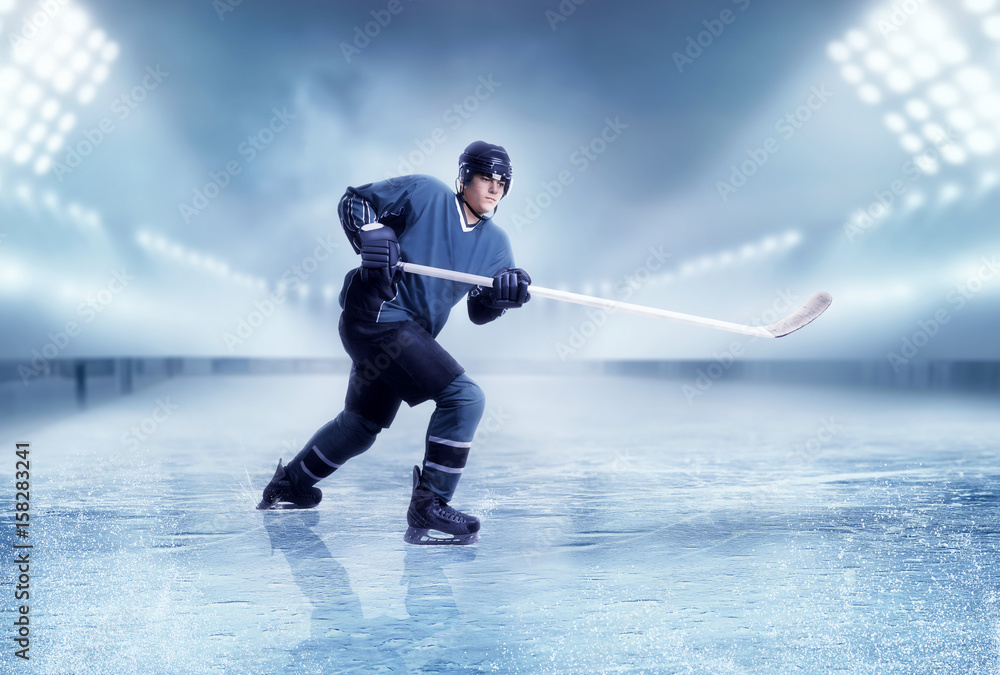 Fototapeta premium Professional ice hockey player shooting