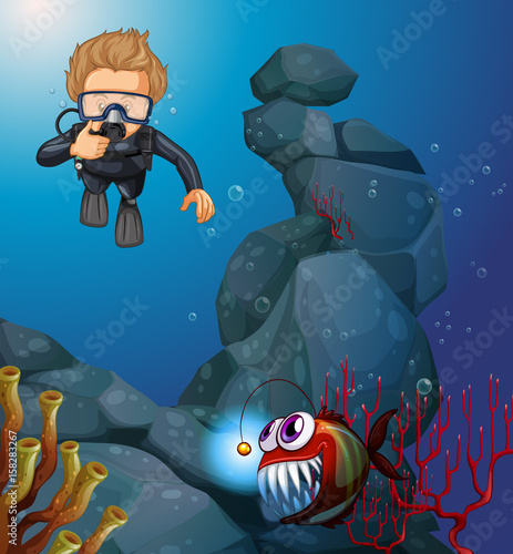 Diver diving in deep blue sea