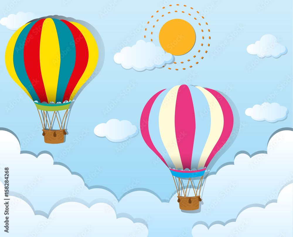 Naklejka Two balloons flying in blue sky