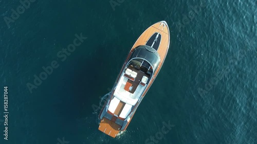 Perpendicular aerial view of luxury boat anchored. photo