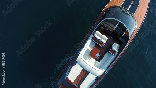 Perpendicular aerial view of luxury boat anchored.