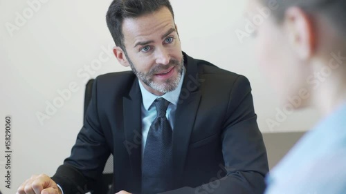 Real estate agent meeting with client