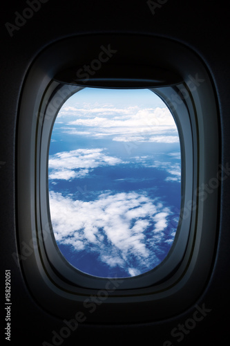 A heavier sky with clouds from the plane's window
