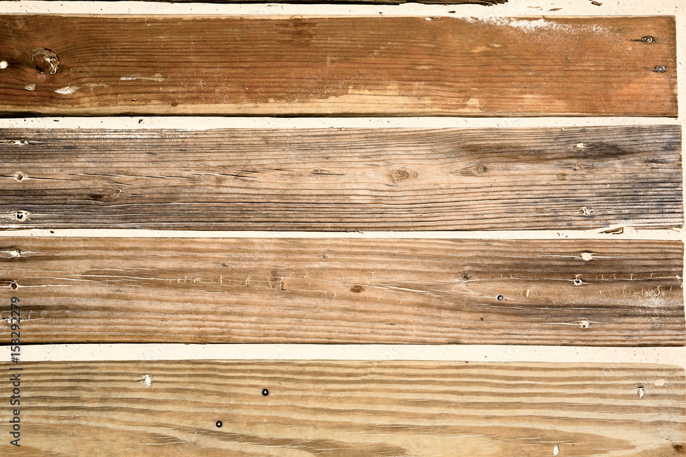Fototapeta premium Brown wooden planks in the sandWood texture