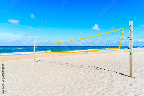 Volleyball net on sandy beach near Kampen village on Sylt island, North Sea, Germany