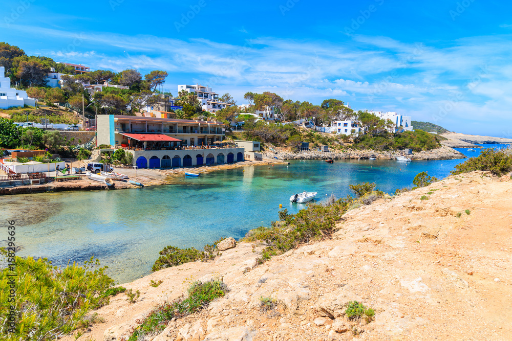 View of small port in Cala Portinatx bay, Ibiza island, Spain