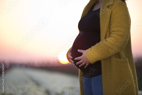 Pregnant at dusk photo