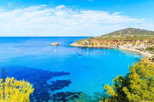 Fototapeta Naklejka Na Ścianę i Meble -  View of Cala d'Hort bay with beautiful azure blue sea water, Ibiza island, Spain
