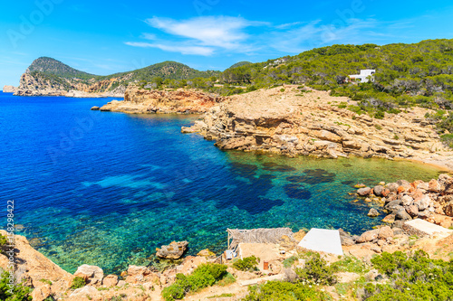 Fototapeta Naklejka Na Ścianę i Meble -  Blue sea water of Punta Galera bay surrounded by amazing stone formations, Ibiza island, Spain