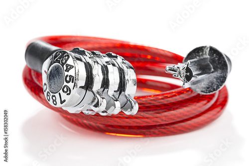 Red combination bicycle lock isolated on white background.