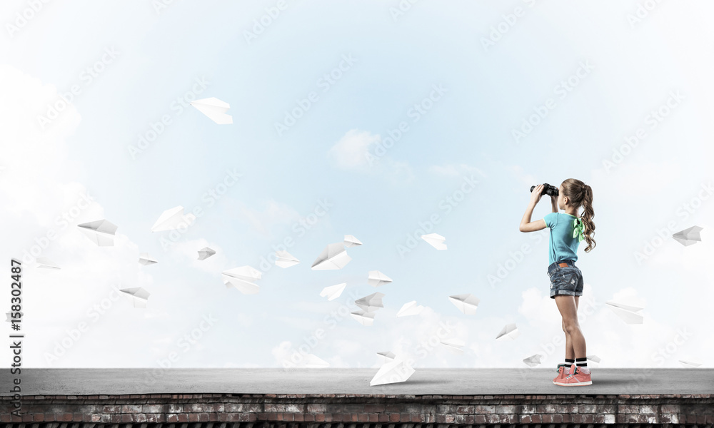 Concept of careless happy childhood with girl of school age look Concept of careless happy childhood with girl of school age look
