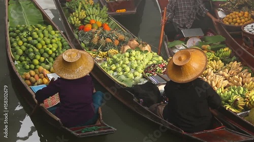 Fruits and vegetables were sold on boat the Damnoen saduak floating market is famous in Thailand