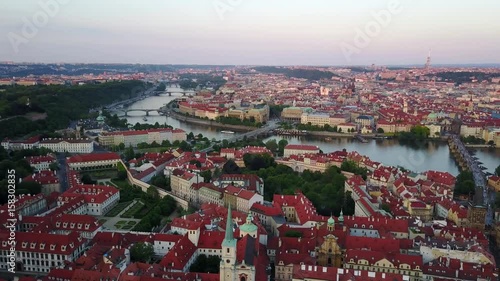 Beautiful panoiramic aerial view of the Prague city from above with the old town and Vitava river. Amazing city landscape footage.  photo