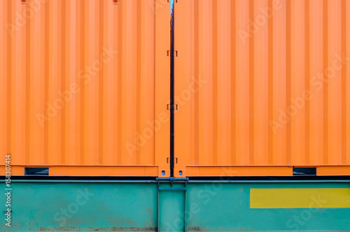 Twin cargo container texture. Transportation of cargoes by rail in containers. Railway infrastructure background
