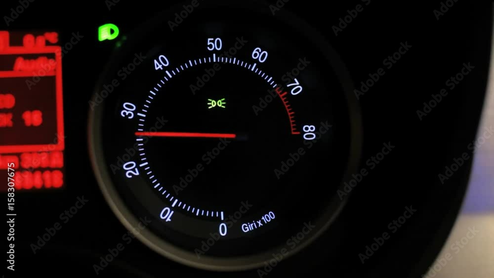 Tachometer revving. Car tachometer arrow revving. Engine rpm meter. Tachometer display. Close up of tachometer speed. Auto increases the speed. Rmp gauge Tachometer revving. Car tachometer arrow revving. Engine rpm meter. Tachometer display. Close up of tachometer speed. Auto increases the speed. Rmp gauge