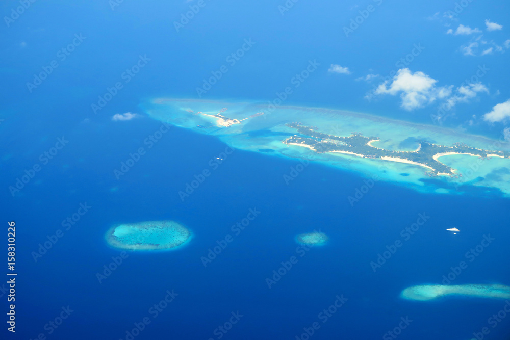 Maldives islands top view from airplane Maldives islands top view from airplane