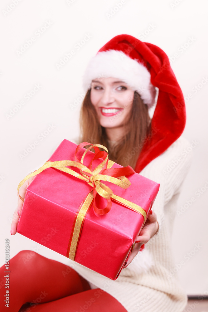 Woman holding gift box. Christmas time Woman holding gift box. Christmas time