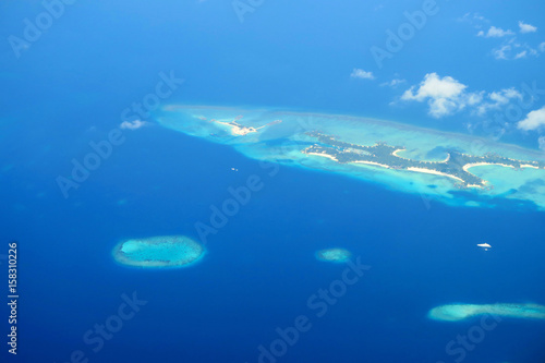 Maldives islands top view from airplane photo