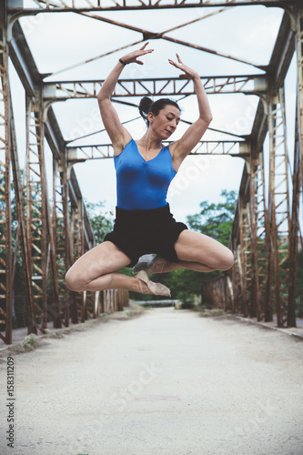  beautiful ballerina dancing in the bridge