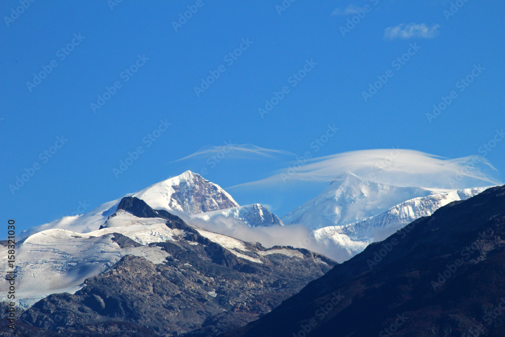 Typical foehn clouds, altocumulus lenticularis lent, in the mountains, Patagonia, Chile
