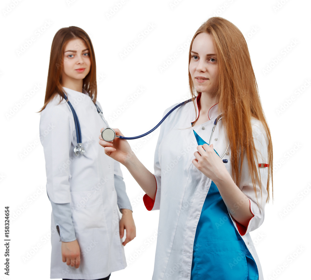 Two young woman doctor on white isolated background Two young woman doctor on white isolated background