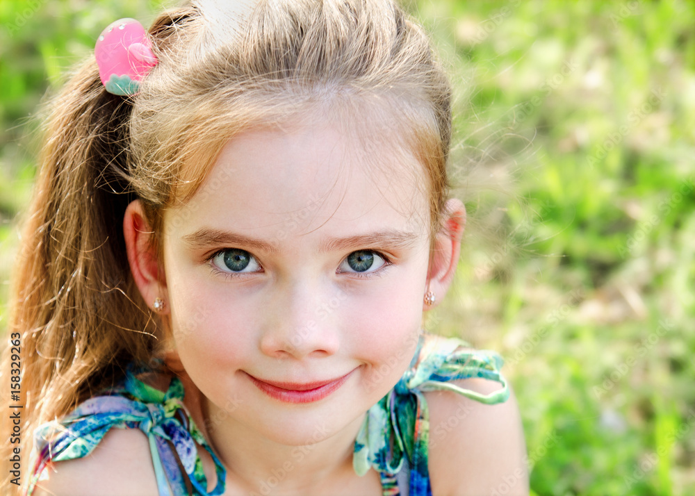 Portrait of adorable smiling little girl outdoor Portrait of adorable smiling little girl outdoor