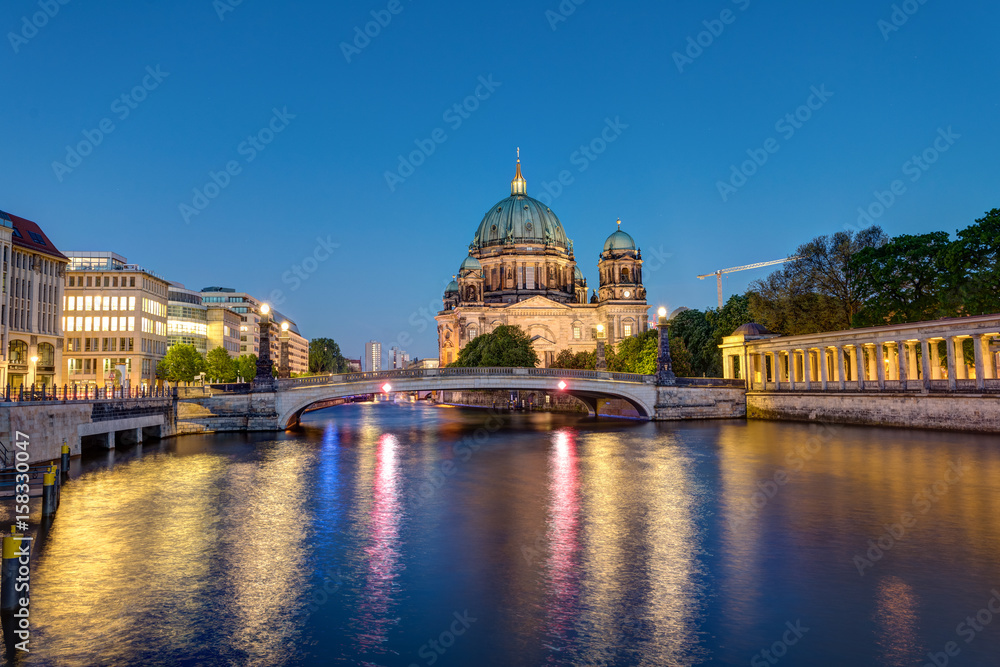 The Berlin Cathedral at the river Spree at night