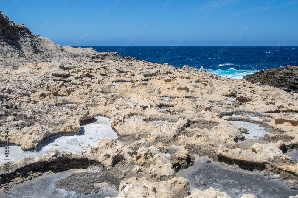 Salt Pans near Azure Window at Gozo island, Malta.