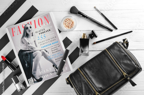 Cosmetics and magazine on w...